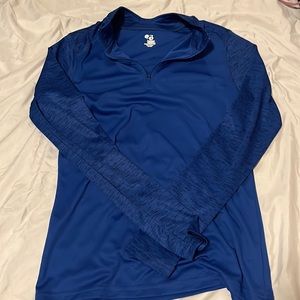 A dark blue quarter zip up, size M